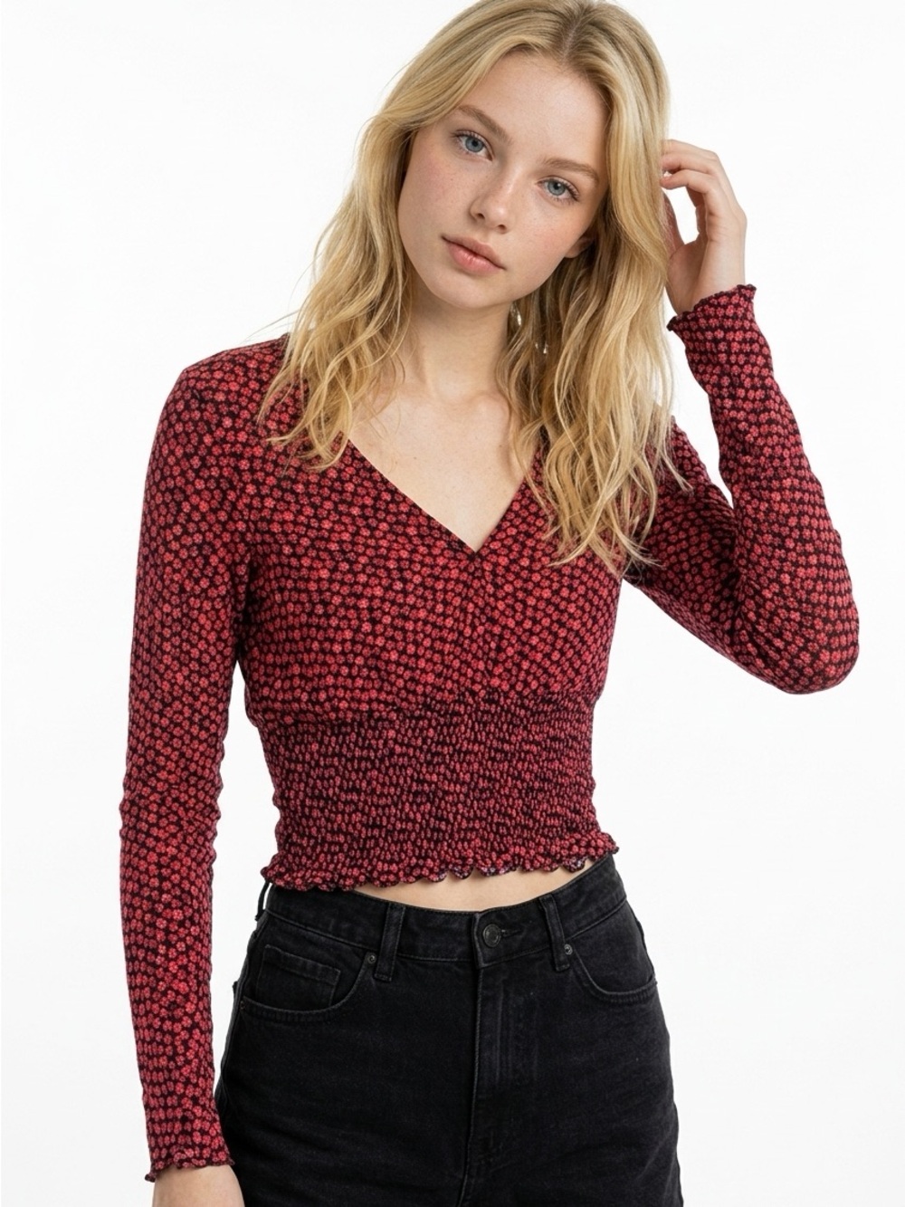 Paper crane size Small smocked cropped top. Long sleeve v neck.